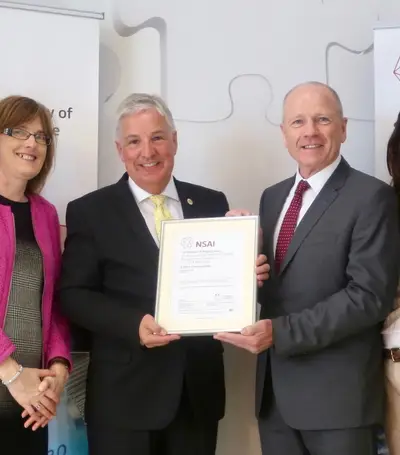 Joe O'Dwyer, Health and Safety Manager; Geraldine Larkin, NSAI CEO; Fergal O'Byrne, Head of Business Excellence at NSAI; Tommy Drumm, Managing Director; Rebecca Reilly, Quality and Environmental Manager; and David Lee, Construction Director.