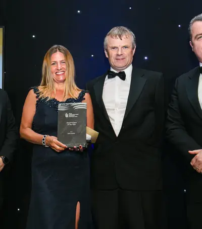 Donal Duggan (Head of Business, Audi Centre), Linda Byrne (Bunzl Cleaning & Safety Supplies), John Sweeney (Senior Contracts Manager, Collen Construction) and Donal Hennessy (Director, Collen Construction) collecting the award for Retail Project of the Year - Audi Centre.